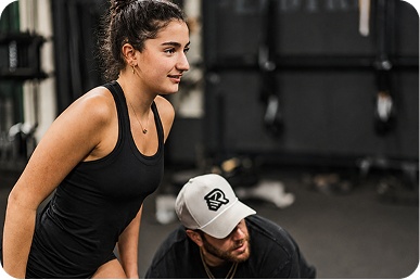 Young athlete receiving running analysis physical therapy for safer return to play
