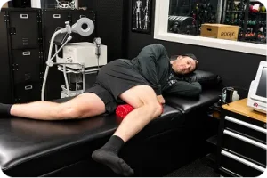 Athlete receiving physical therapy for sports injury recovery and rehabilitation