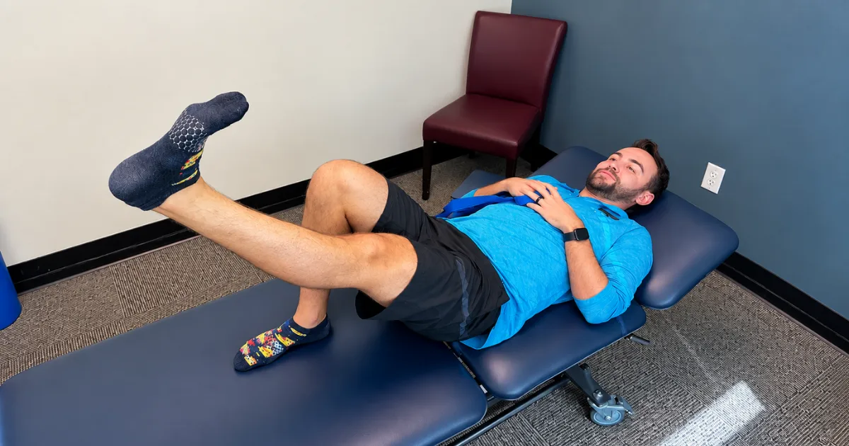 Patient performing quadriceps activation exercise as prehab before ACL surgery