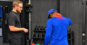Physical therapist assessing neck rotation during whiplash treatment
